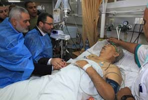 Egypt Prime Minister Hisham Qandil urges world to stop Israel 'aggression' on Gaza 