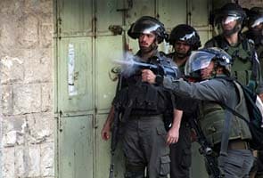 Israel raids kill 31 in Gaza as truce efforts intensify