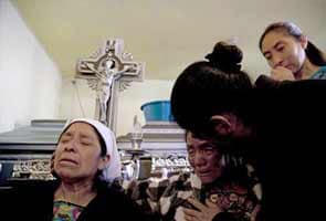 Villagers mourn family; Guatemala quake toll at 52 