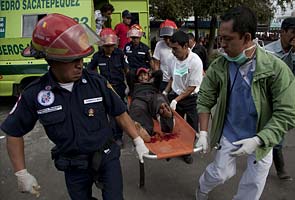 Guatemalans huddle in streets after deadly earthquake