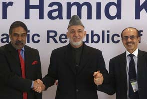 Hamid Karzai beckons India's business leaders to invest