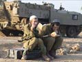Israel halts threatened Gaza invasion as truce talks build