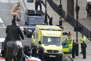 Naked man brings London to standstill