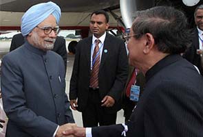 Prime Minister Manmohan Singh reaches Cambodia for South Asian summits