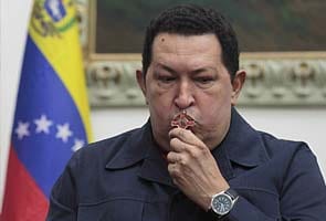 Hugo Chavez improving after surgery complications