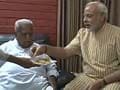 Narendra Modi visits rival Keshubhai Patel, feeds him sweets