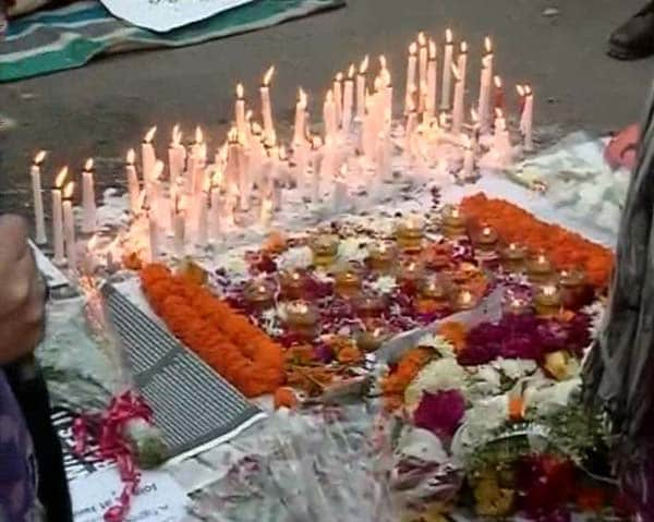 In memory of 'Amanat', a makeshift memorial, protests continue