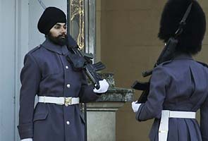 Sikh soldier wears turban on palace guard duty