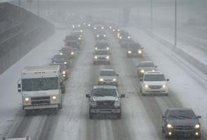 Hundreds of flights cancelled after major snowstorm in US Northeast