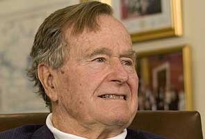 Former US President George H W Bush remains hospitalised