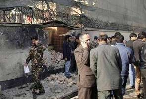 Taliban suicide attack on Afghan NATO base kills 12