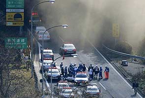 Japan tunnel collapse sets cars on fire, seven feared trapped