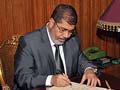 Egypt's Mohamed Morsi to give speech after signing in new charter