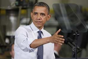 Obama hits out at 'Scrooge' Republicans on tax