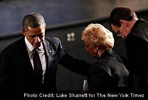 Barack Obama tells town 'these tragedies must end'