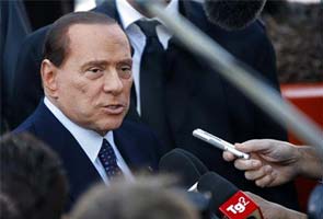 Silvio Berlusconi, Mario Monti set fiery Italian campaign tone