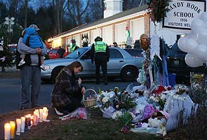 Funerals begin for Newtown victims as schools confront tragedy