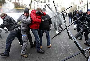 ArcelorMittal workers and police clash outside Belgium PM's house