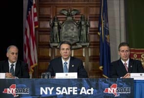 New York seals first state gun laws since Newtown massacre 