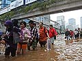 Indonesian authorities battle floods in capital