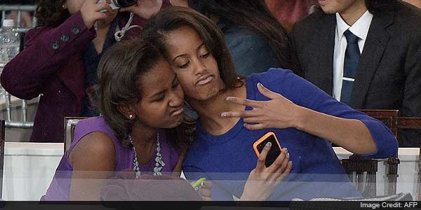 On day that's anything but normal, Obama girls are just that On day that's anything but normal, Obama girls are just that