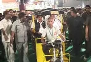 Sharad Pawar shares solar auto rickshaw ride with Nitin Gadkari