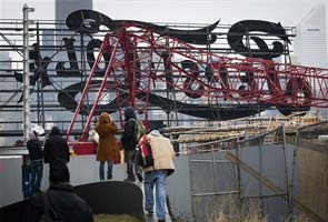 Seven hurt as crane collapses at construction site in New York