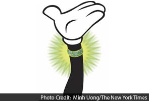 At Disney parks, a bracelet to build loyalty (and sales) At Disney parks, a bracelet to build loyalty (and sales)