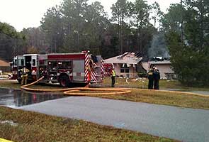 Small plane crashes into home near Florida airport; three dead