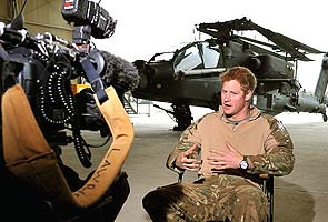 Home from Afghanistan, Prince Harry steps back into glare