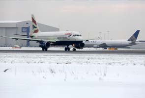 London Heathrow cancels more flights as snow continues