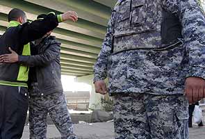 Iraq looks to put a squeeze on overweight policemen