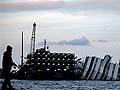 A Tower of Babel rises around Italy cruise ship wreck