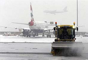 Over 250 flights cancelled at Heathrow due to heavy snow, thousands stranded