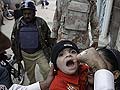 Policeman escorting Pakistani polio team killed