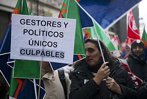 Anger mounts over corruption in recession-hit Spain