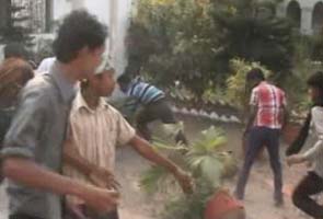 Congress minister watches as workers attack District Collector's home in West Bengal