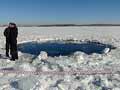 Divers scour Russian lake after meteor strike injures 1,200 Russians