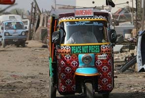 Eye-catching rickshaws promote peace in Pakistan