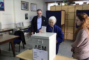 Cyprus holds presidential poll in economic crisis