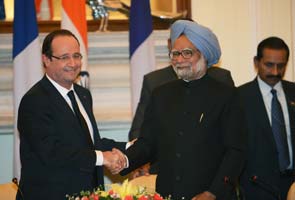 French President Francois Hollande holds talks with Prime Minister Manmohan Singh, sees progress on $12bn fighter jet deal