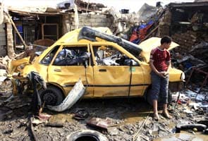 Iraq bombs kill 36, Sunnis stage protest rallies 
