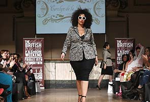 Plus-size women turn up to London Fashion Week in lingerie to protest the  lack of curves