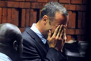 Sobbing Oscar Pistorius accused of 'premeditated' girlfriend murder