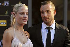 Paralympics champion Oscar Pistorius appears in court on charges of killing his girlfriend
