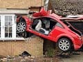 Man seriously hurt as crash leaves Audi embedded in UK home