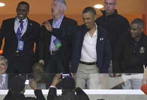 Barack Obama plays golf, attends college basketball playoff game