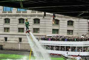 A river in Chicago dyed green as St Patrick's Day celebrations begin across US 