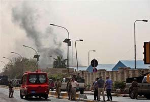 Blasts, clashes kill at least 25 in central Baghdad
