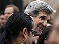 John Kerry makes surpise visit to Iraq to press for Syria cooperation